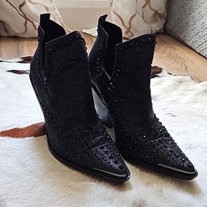Black studded booties by Gianni Bini